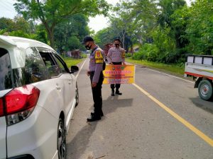 Polsek Bambalamotu Laksanakan Ops.Yustisi di Perempatan Kasoloang - Kalukunangka.