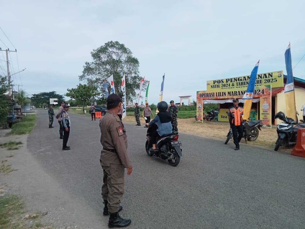 Personel Pos Pam Anjungan Polres Pasangkayu Rutin Laksanakan Pengaturan Lalu Lintas