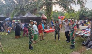 Bhabinkamtibmas Polsek Bambalamotu Pengamanan Pemindahan Pasar Tradisional 